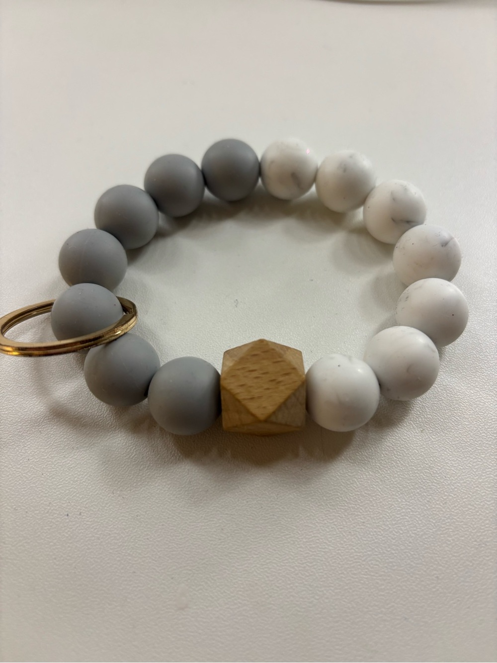Gray and White Beaded Wrist Key Holder with Wood Accent